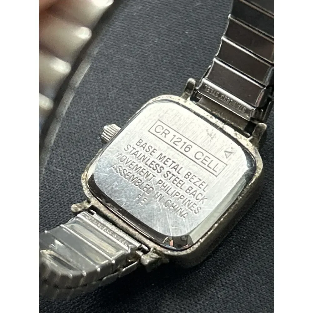 Carriage Navy Blue Dial Silver Tone Women’s Stretch Band Quartz Watch